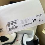 Alexander McQueen ❤️ tread heeled Chelsea boot in ivory/black Photo 12