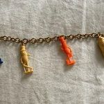 Vintage Advertising PLANTERS MR PEANUT Figural Plastic Charm Bracelet 7” Long Orange Photo 0