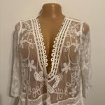 Eomenie. Vancavoo Beach Cover Up for Women Crochet Beach Dress Swimwear Lace Cover Ups Women's Beachwear Summer V Neck Floral Bikini Swimsuit Beach Sarongs See Through Hollow Out Dress(White) Photo 6