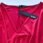 Krisa NWT Revolve Drape Skirt Surplice
Dress Photo 4