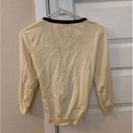 Unique Vintage 3 for $15! Vintage Yellow cream Cardigan sweater with purple trim Photo 1