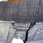 Athleta woman’s size 2 Women's  Brooklyn Lined Jogger Pants Black Camo Photo 2