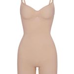SKIMS SKINS
SEAMLESS SCULPT
BRIEF BODYSUIT MICA S/M Photo 0