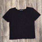 Brandy Melville  Black Ribbed Ruffle Trim Top Photo 0
