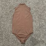 SKIMS  tan high-neck bodysuit size S/M Photo 1