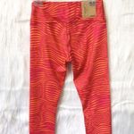 Reebok 🆕 Skinny Orange Wave Capris Photo 1