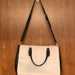 Kate Spade Cream and Black Large Leather Satchel Handbag with Crossbody Strap. Photo 4