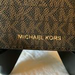 Michael Kors : Brown Passport Holder- card slots Photo 1