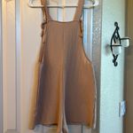 Emery Rose Tan waffle print romper with adjustable straps and two front pockets Photo 2