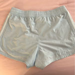 Adidas  light blue shorts size extra small Photo 0