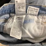 Levi's Levi’s Mom Jean Size 24 with distressed rip on one knee New With Tags Photo 4