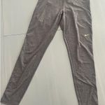 Nike Pro Dri-Fit Gray Womens Leggings size Medium Glitter Swoosh Photo 1