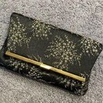 Vintage black and gold fold over clutch Photo 0