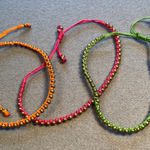 Woven wrap beacelets in 3 colors, brass beads, adjustable size Green Photo 0