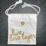 Gorjana  Gold and White Jewelry Pouch Photo 0