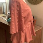 E & M A Beautiful faux wrap top! Photo 1