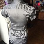 EXPRESS Silky elite stretch ruffle front blouse Photo 1