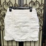 Anthropologie Endless Rose all over ruched white mini skirt with ruffle hem Photo 4