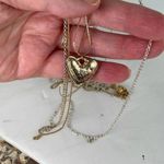 Boutique Long three strand necklace with pearl covered heart pendant. Photo 3