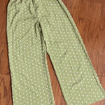SheIn Olive Green high waste Polk dot wide leg pants - Size Small with Bag. Gently warn once and excellent condition. Measurements approximately 12” waste not fully stretched out from elastic waste band x 12” rise x 43” long. None smoking home. Priced to sell at as is condition. Don’t like my price, make reasonable offer. Photo 0