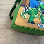 Lounge Fly  X Pixar Toy Story Rex Little Arms Mini Backpack Photo 1