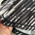 Athleta  Black and White Striped Pulse running short Size Medium Photo 1