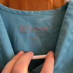 Grey's Anatomy  professional wear scrub top in blue size xsmall Photo 1