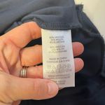 Stella & Dot Navy long sleeve ruffle side slit hem top shirt size small Photo 4