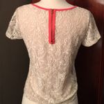 Urban Outfitters  Beige lace top with coral neckline Photo 1