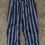 The Copper Closet Black And White Striped Jumpsuit Photo 0