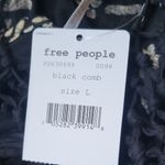 Free People  Crochet Boho Flowy Asymmetrical Cut Out Tank Top Size L Photo 6