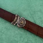 Ladies leather reversible belt black and brown with embellishments. Size med/30. Photo 8