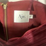 Revolve AJE. Crop Top In Burgundy  Photo 4