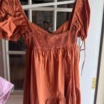 Olivaceous Burnt orange babydoll puff sleeve sundress Photo 3