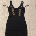 2b Bebe women size XS Y2K bandage black dress and gold accents on the back Photo 1
