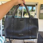 Calvin Klein Leather Shoulder Bag with Grommets and Magnetic Closure Photo 1