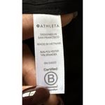 Athleta  Zephyr Black Tank Lightweight Tulip Hem Silky UPF 50+ Travel Top Sz M Photo 5