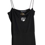 Pretty Little Thing Black Slinky Branded Trim Flared Jumpsuit Women's Size 4 Photo 3