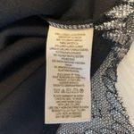 Free People  Lace Overlay Scalloped Hem Mini Skirt Black/Silver Metallic Size 2 Photo 5