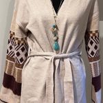 Hem and Thread Sweater Photo 0