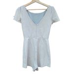 Ark & Co. small cream colored romper with blue animal print Photo 1