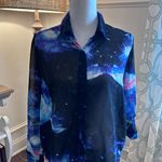 Truth NYC EUC semi sheer star blouse with tulip open hem back. Hidden buttons and roll up sleeves with button if desired. Photo 0