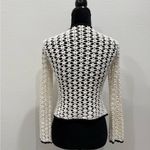 White Crochet Cardigan with Black Trim Photo 1