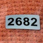 Free People We The  Women’s Size XS Orange Oversized Swing Thermal Waffle Top Photo 6