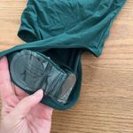 Green one piece swimsuit Size 2 Photo 1