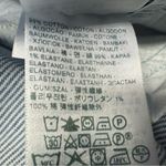 Levi's  524 Ultra Low Rise Skinny Leg Jeans with a blue and white striped pattern Photo 5