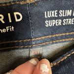 Torrid  Luxe bootcut mid rise jeans dark wash size 26T Photo 6