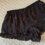 Dolls Kill Witty Fox Black ruffle trim, cherry print pull on elastic waist mini shorts S Photo 1