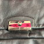 Coach Black Crossbody Bag with Adjustable Strap and Flap Closure Photo 1