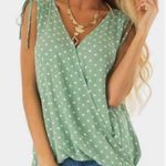 Green polka dot tank top size large crunched shoulders green and white s… Photo 0